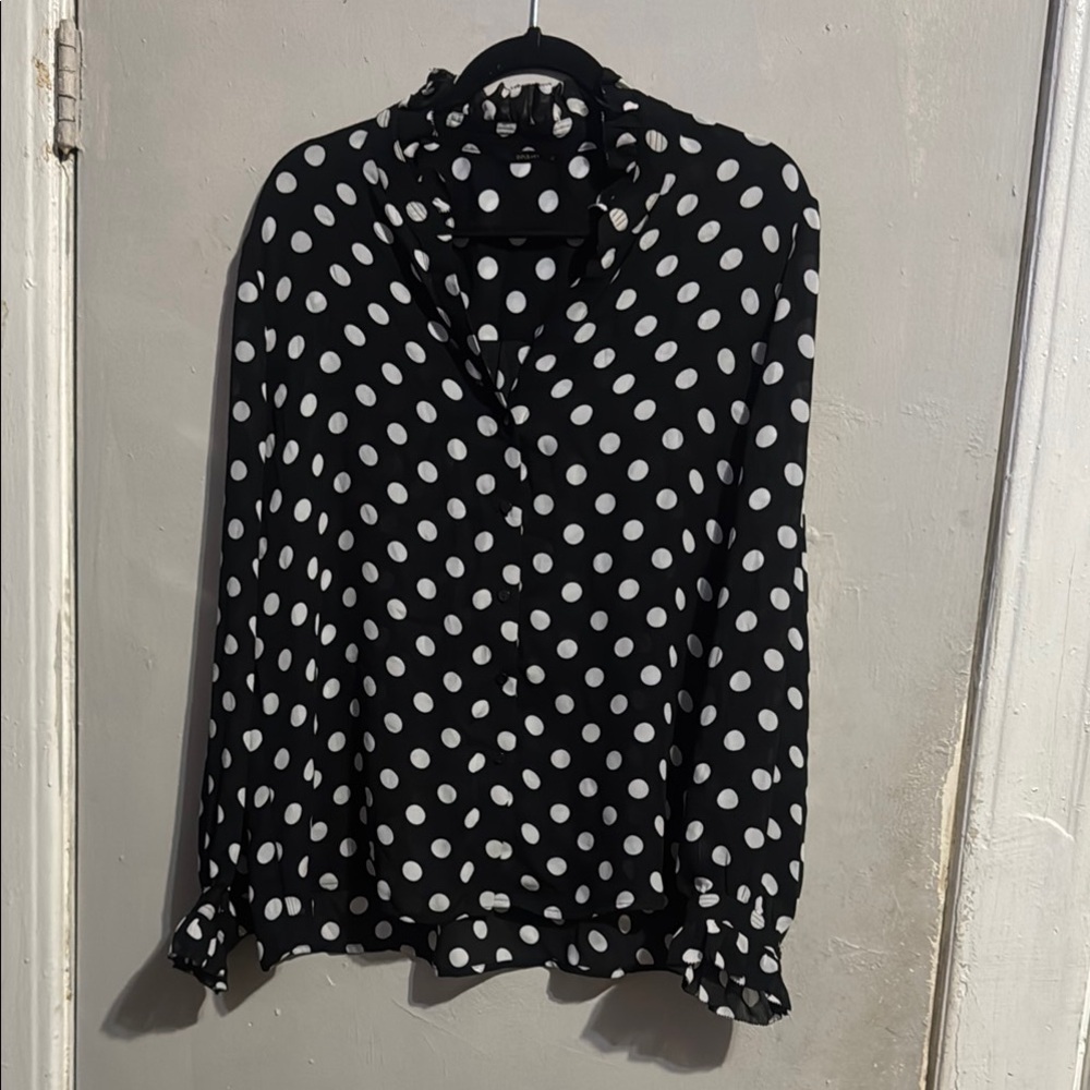 Black and White Ruffled Blouse with Cuffed Sleeves